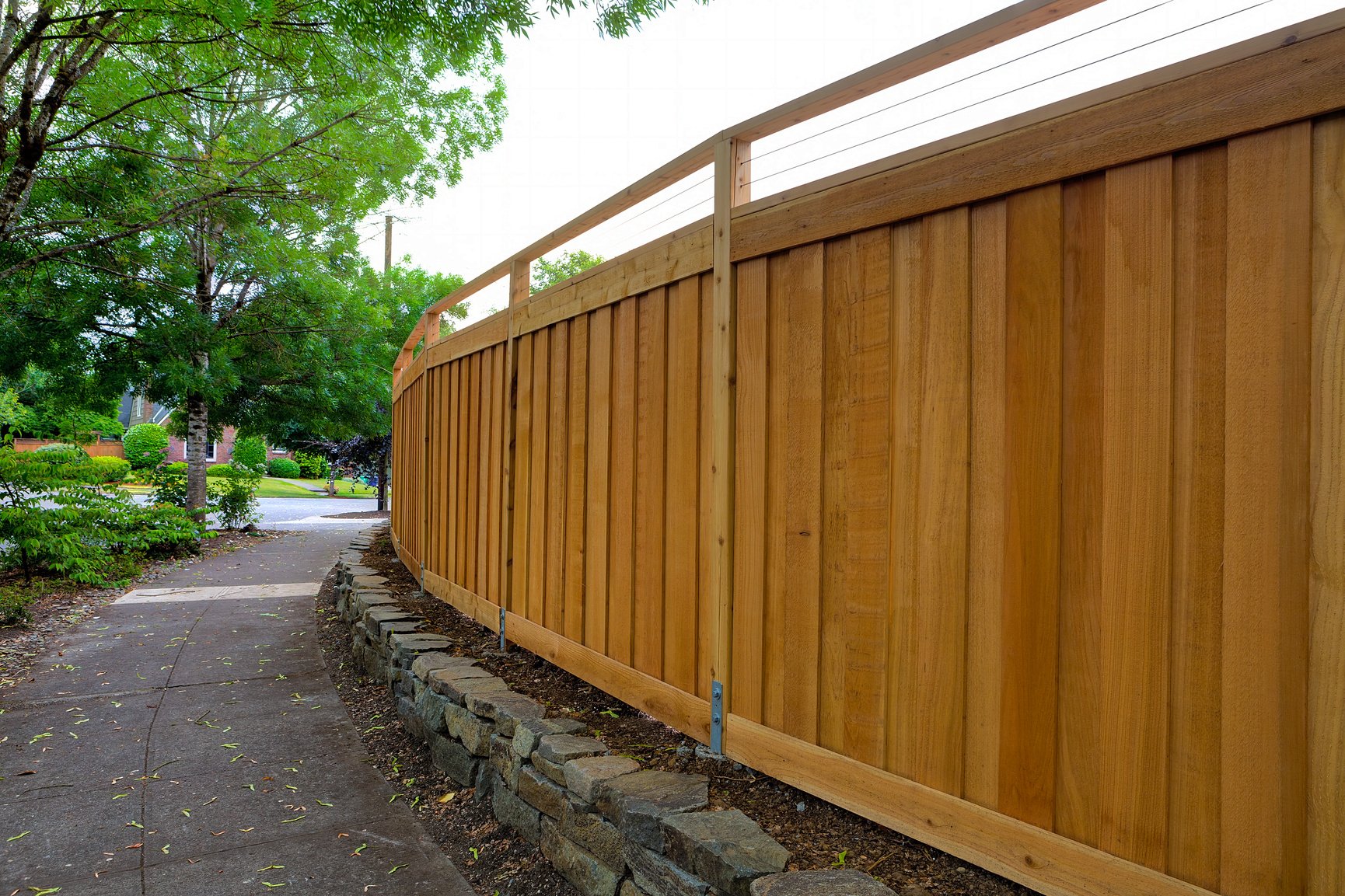 New Cedar Wood Fence around house backyard landscaping