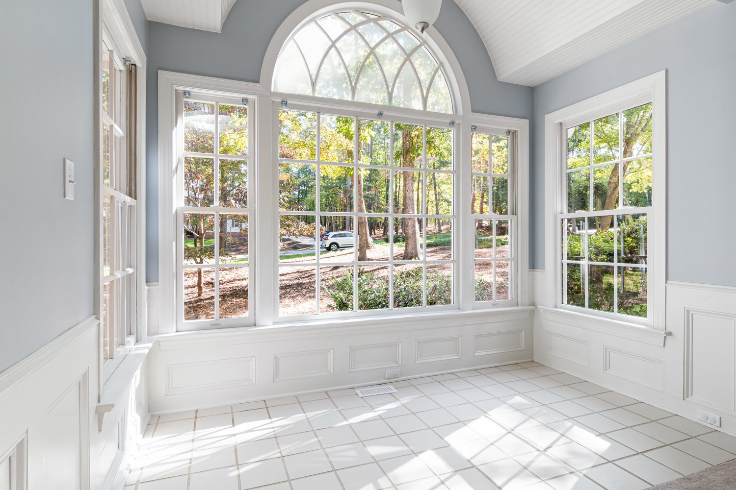 Glass Windows with White Wooden Frame